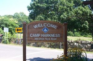 Sign that says, "Welcome to Camp Harkness"